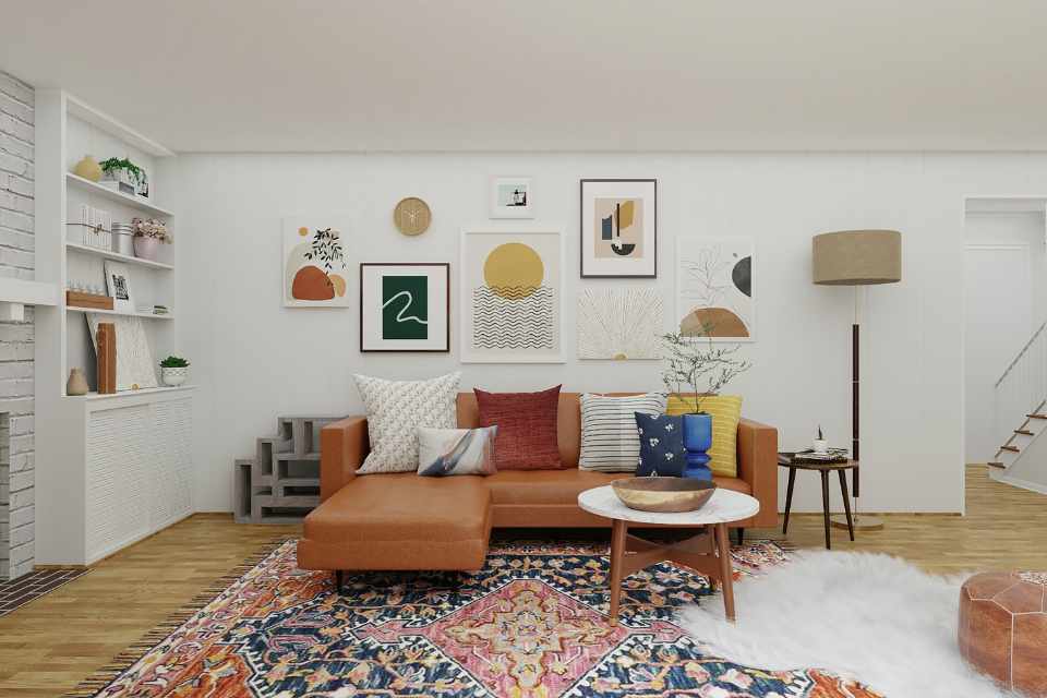 earth tones in living room with leather couch and wall art gallery